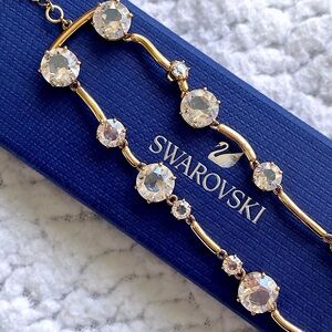 Swarovski “Constella” Gold-tone Double-Row Bangle Bracelet